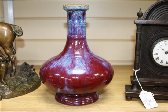 A Chinese famille rose crackleglaze vase and a Jun type vase tallest 34cm